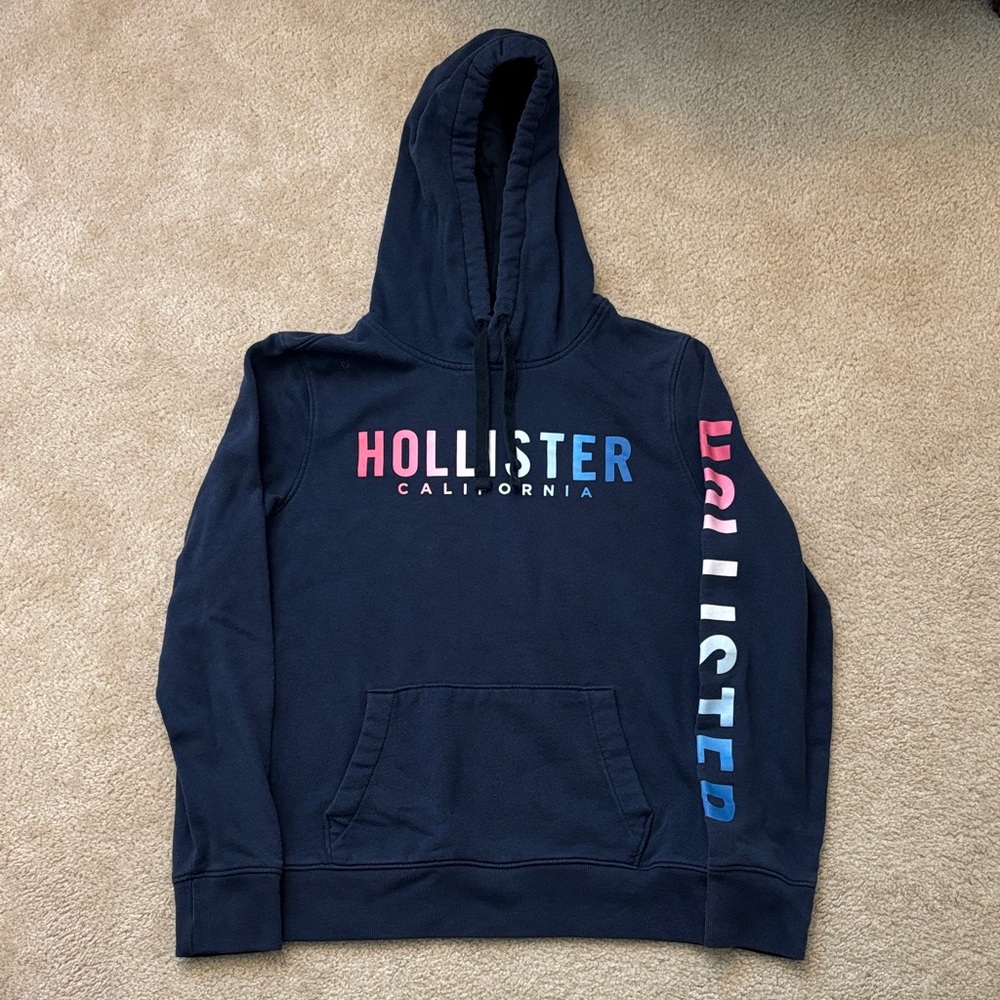 Hollister Men's Dark Blue Hoodie with Multicolor Logo